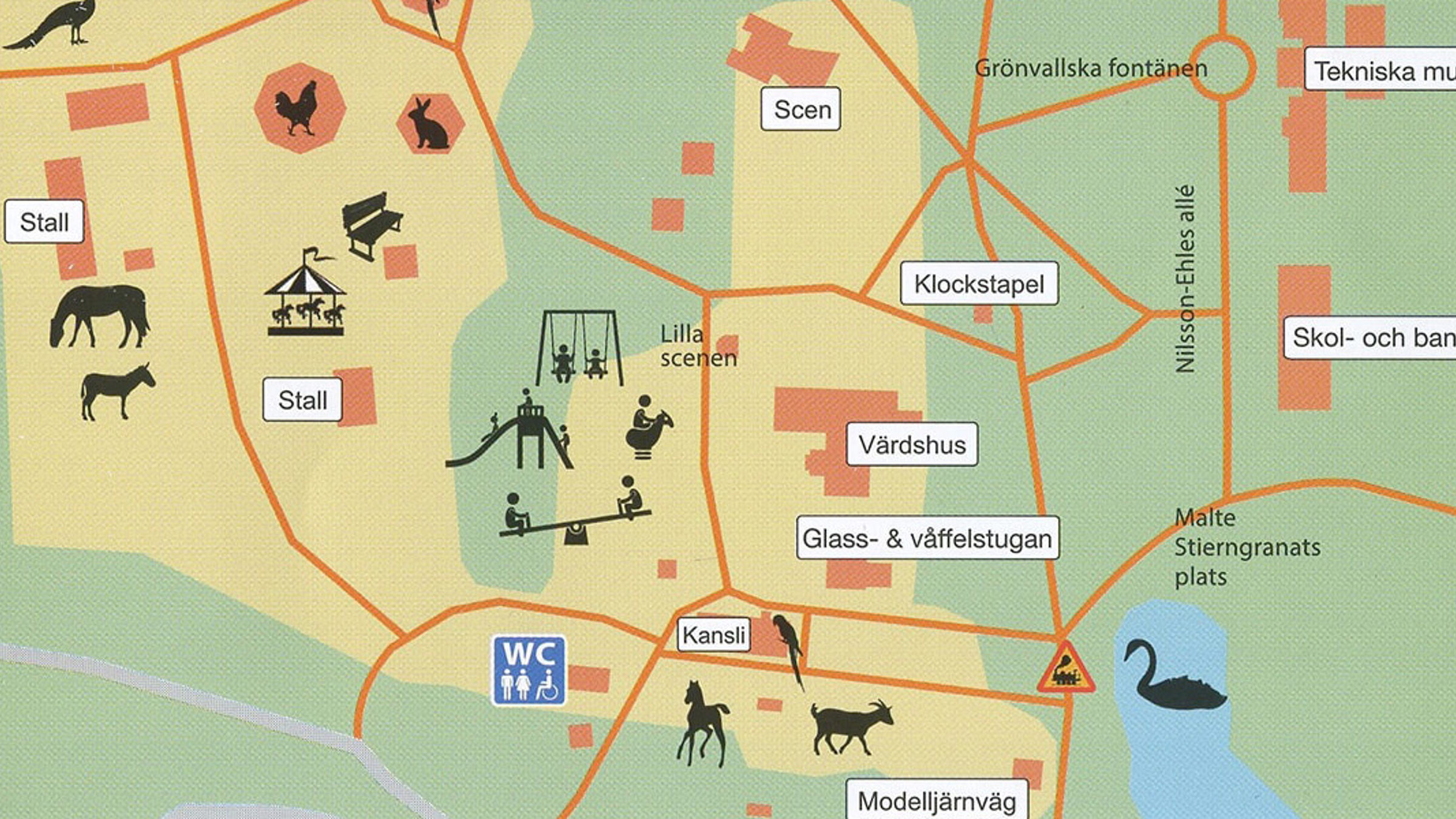 Kort over park med stalde, legeplads og scener, markeret med ikoner for dyr, legeplads og spisesteder.