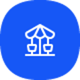 Oplevelser ikon med karrusel i hvid på blå baggrund, symboliserer underholdning og fornøjelse.