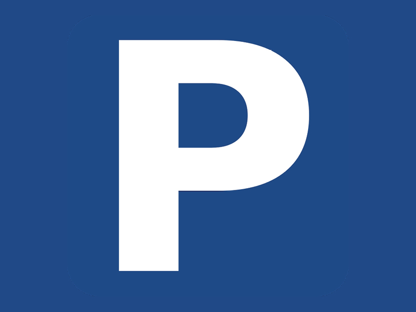 Stort hvidt "P" på en blå baggrund, der symboliserer en parkeringsplads eller parkeringstjeneste.